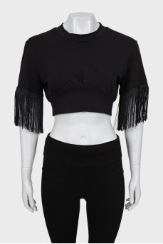 Black top decorated with fringe