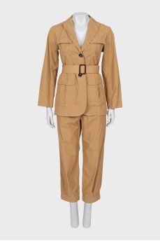 Suit with patch pockets and belt