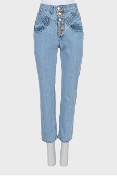 Jeans with buttons and raised seams