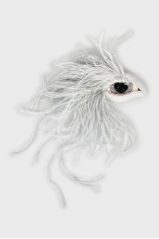 Brooch decorated with feather