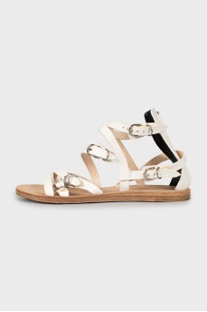 White sandals with leather straps