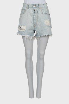 Denim shorts with torn and distressed effect