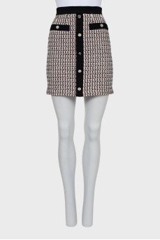 Mini skirt with silver buttons