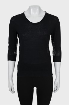 Black jumper decorated with lace