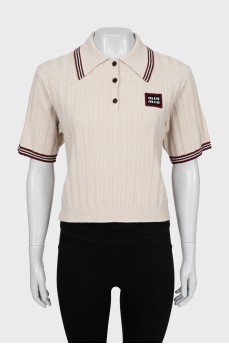 Knitted polo with short sleeves
