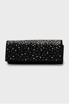 Suede clutch decorated with rhinestones