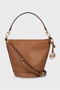 Leather bucket bag with tag
