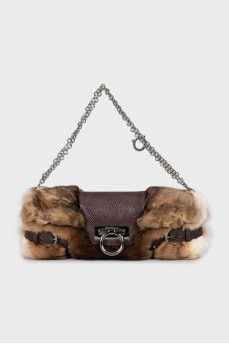 Shoulder bag decorated with fur