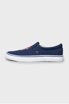 Men's blue slip-ons with tag
