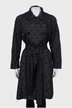 Black raincoat with embossed print