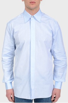 Blue shirt in print with a logo