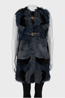 Fur vest with buckles