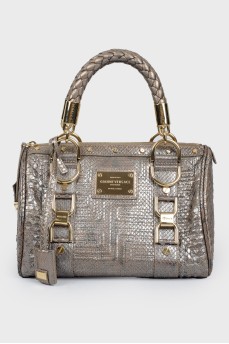 Silver bag with golden fittings