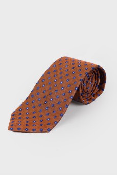 Orange tie in small print