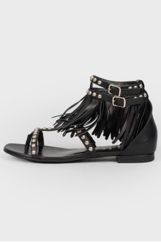 Leather leather sandals with a fringe with a tag