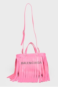 Pink bag with a fringe with a tag