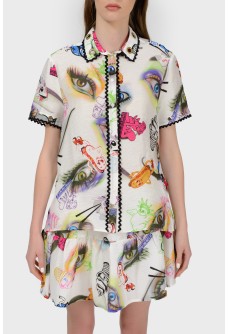 Blouse in an abstract print with a tag