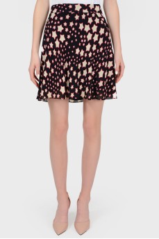 Skirt in the print of stars with tag