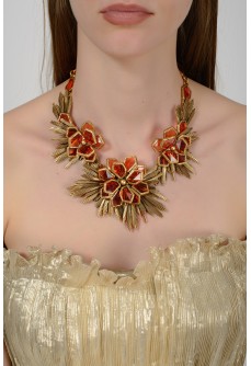 Golden necklace in the form of flowers with amber stones with a tag