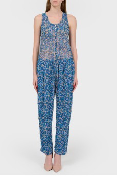 Overalls in a small floral print with a tag