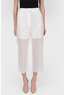 Openwork shortened trousers with a short lining with a tag
