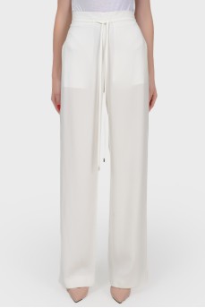 High waist trousers with a backbone with a tag