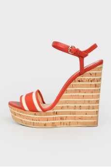 Red textile sandals on a high platform