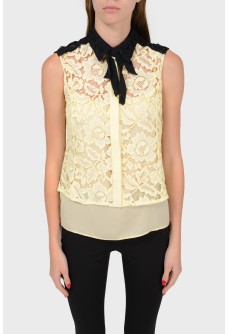 Two-color lace blouse with a top-laying top