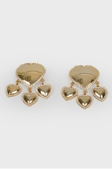 Clip-on earrings in the shape of hearts with stones