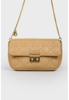 Leather quilted bag with belt-chain