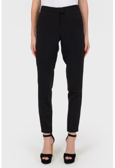 Black trousers with a zip at the bottom
