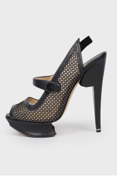 Stiletto sandals with designer soles