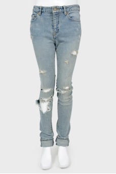 Jeans with the effect of scuffs and holes