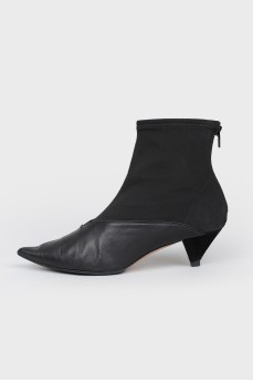 Ankle boots with a fastener on the heel