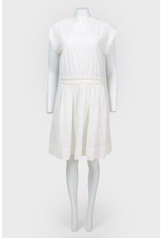 Dress white textured fabric with a tag