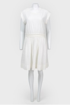 Dress white textured fabric with a tag