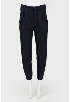 Slim fit trousers with patch pockets