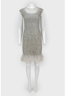 Evening dress with rhinestones and feathers