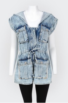 Elongated jeans vest with a hood with a tag