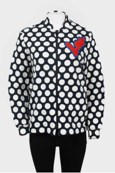 Polka dot bomber jacket with red appliqué