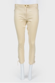 Trousers with decorative lacing