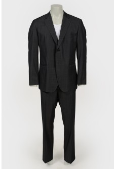 Men\'s single-breasted suit in a cage