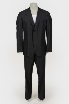 Men's single-breasted suit in a cage