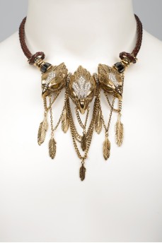 Necklace with metal feathers and eagle heads