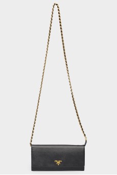 Bag on a metal chain with skin