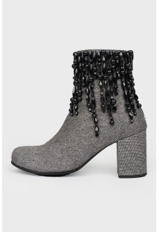 Textile boots with black beads