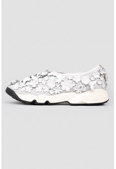 Sneakers with floral appliqués in leather