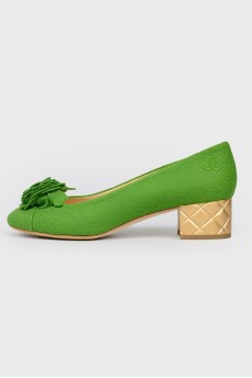 Golden heeled green shoes