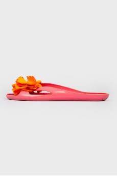 Flip flops cast with a fabric flower