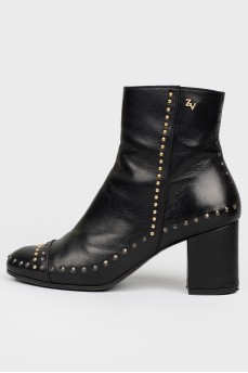 Black leather boots with metal studs